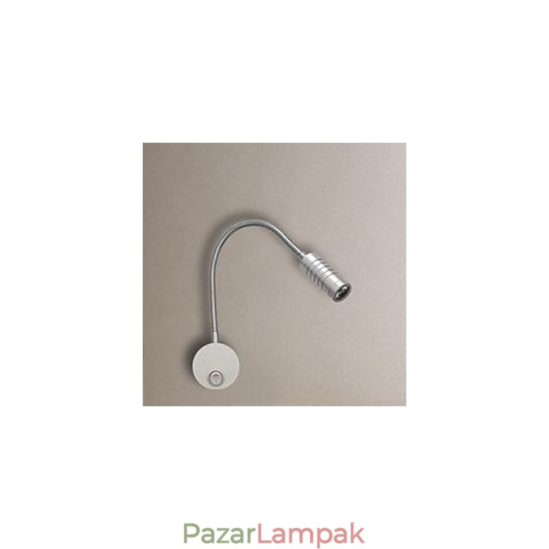 A tömlőágy fejének fali lámpájának fali lámpáját az olvasólámpa világítja meg